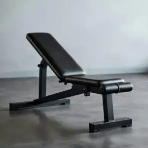 Yoleo adjustable weight bench used as a foundation piece for home gym essentials for beginners.