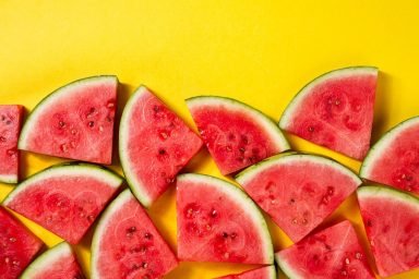 Slices of fresh watermelon representing the flavor profile of Optimum Nutrition sugar-free energy drinks for working out.