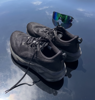 ASICS Novablast 5 black running shoes—essential beginner running gear.